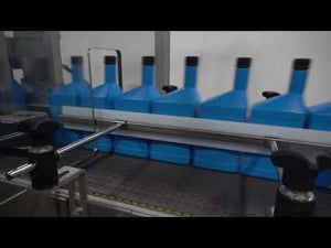 Combis DPI Drop Packer Efficiently Case Packing Bottles of Automotive Oil